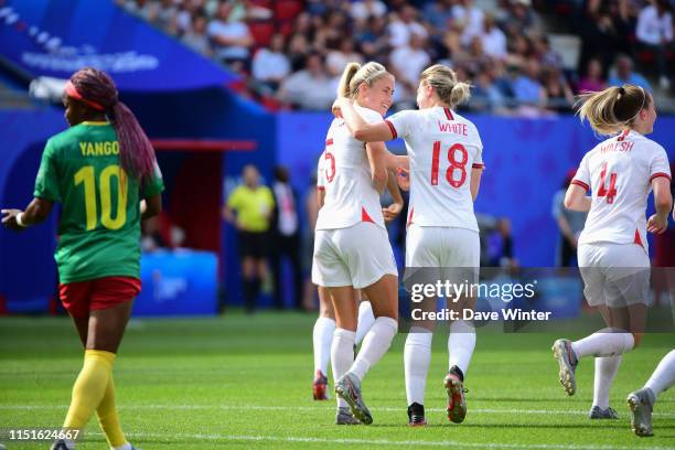 Steph Houghton of England is congratulated after putting her side 1-0 ahead during the Women's World Cup match between England and Cameroon at Stade...