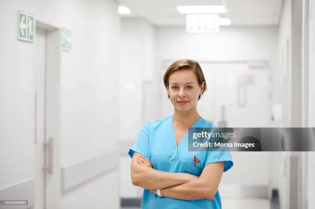 Portrait of confident female nurse in hospital