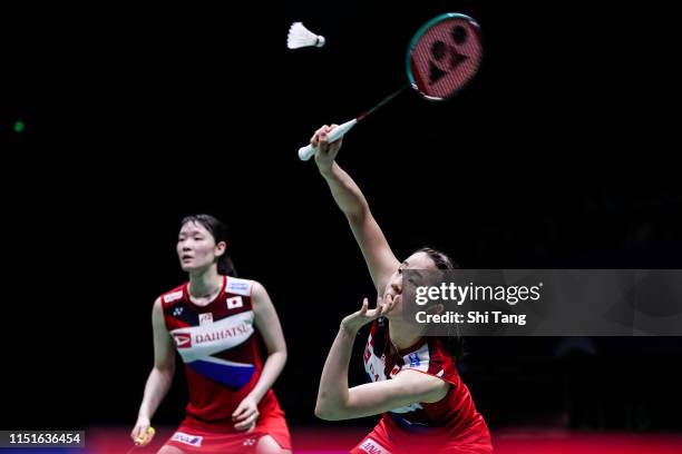 Mayu Matsumoto and Wakana Nagahara of Japan compete in the Women's Doubles semi finals match against Greysia Polii and Apriyani Rahayu of Indonesia...