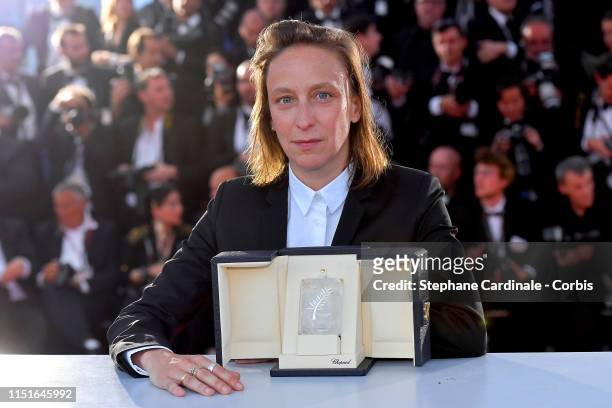 Celine Sciamma, winner of the Best Screenplay award for her film "Portrait de la Jeune Fille en Feu", poses at the winner photocall during the 72nd...