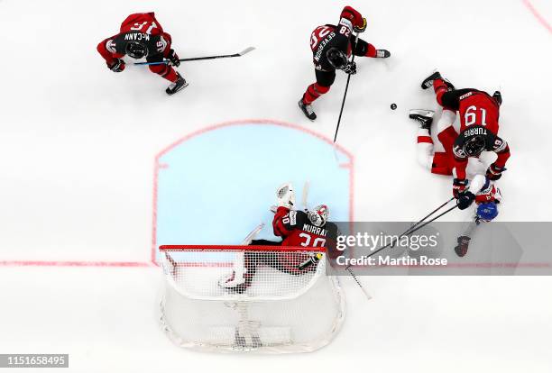Kyle Turris of Canada challenges Tomas Zohorna of Czech Republic during the 2019 IIHF Ice Hockey World Championship Slovakia semi final game between...