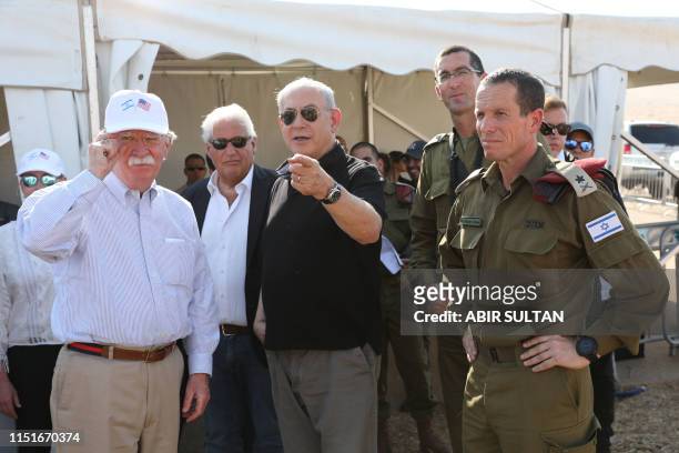 National Security Advisor John Bolton , Israeli Prime Minister Benjamin Netanyahu and US Ambassador to Israel David Friedman visit an old army...