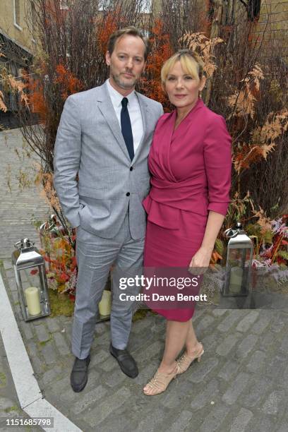 Russell Thomas and Kim Cattrall attend the Midsummer Party for The Old Vic at The Brewery on June 23, 2019 in London, England.