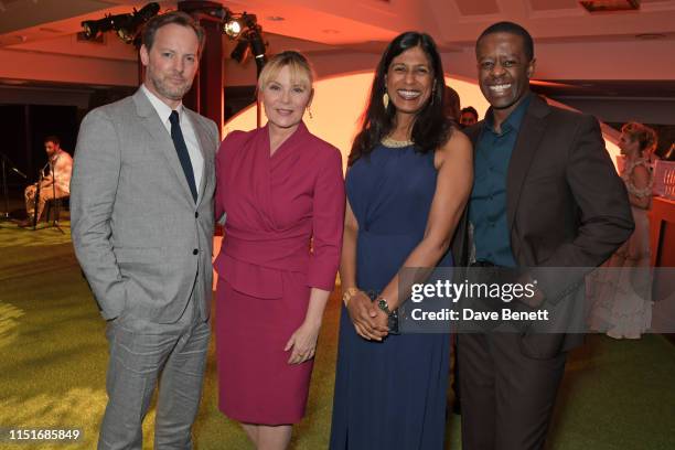 Russell Thomas, Kim Cattrall, Lolita Chakrabarti and Adrian Lester attend the Midsummer Party for The Old Vic at The Brewery on June 23, 2019 in...