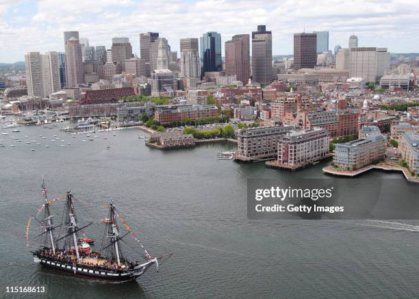 In this image provided by the U.S. Navy, the USS Constitution sails into Boston Harbor during an underway Battle of Midway commemoration on June 3,...
