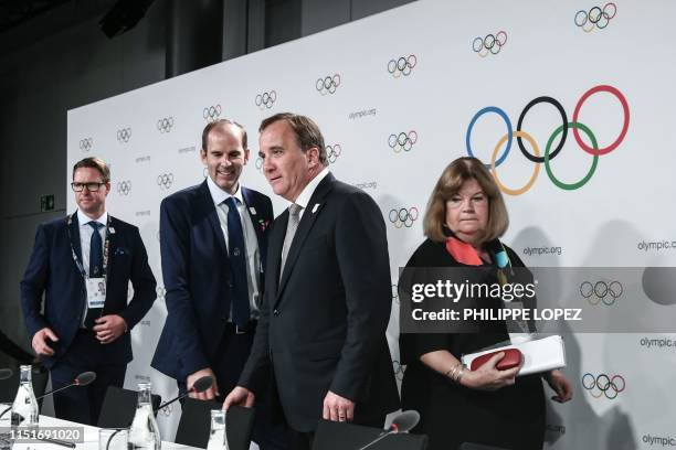 Swedish Olympic Committee president Mats Arjes, Stockholm-Are candidature committee CEO Richard Brisius, Sweden's Prime Minister Stefan Lofven, and...