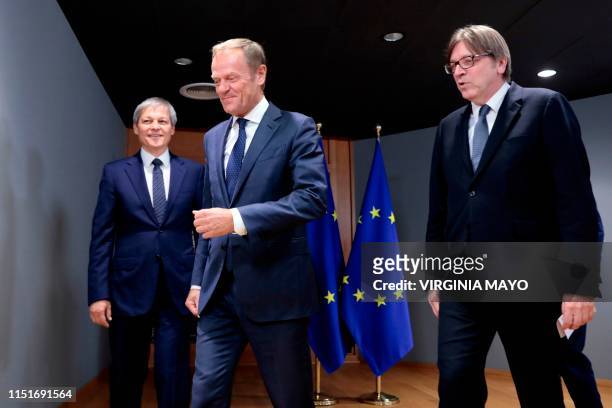 European Council President Donald Tusk welcomes Renew Europe party members Guy Verhofstadt and Dacian Ciolos prior to a meeting at the Europa...