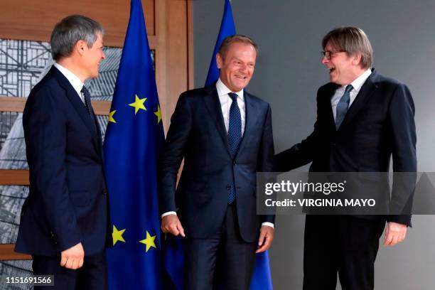 European Council President Donald Tusk welcomes Renew Europe party members Guy Verhofstadt and Dacian Ciolos prior to a meeting at the Europa...