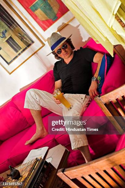 Indian fashion designer Rohit Bal poses during a photoshoot, on June 9, 2007 in New Delhi, India.