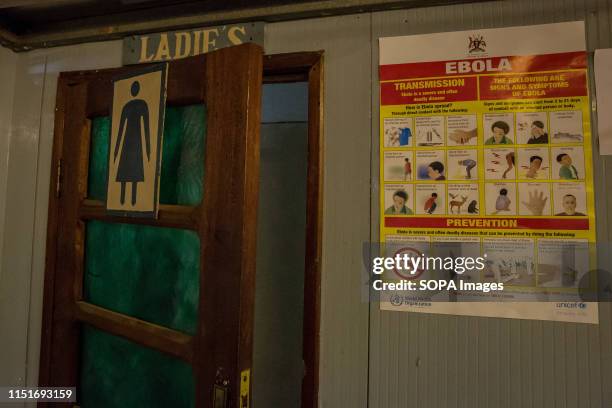 An Ebola placard at Beni airport warns passengers of the symptoms of Ebola in Goma. DR Congo is currently experiencing the second worst Ebola...