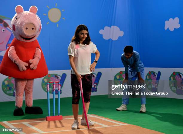 Indian Actor, Soha Ali Khan clicked shooting fun cricket videos with fictional characters, Peppa Pig and George in Mumbai.