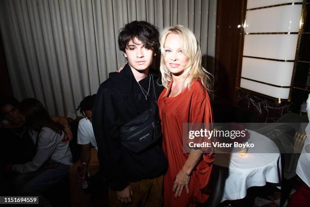 Dylan Lee and Pamela Anderson attend the cocktail party hosted by Chrome Hearts X Jordan Barrett at La Maison Du Caviar on June 22, 2019 in Paris,...