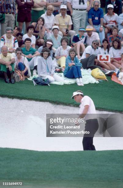 Scottish golfer Sandy Lyle hitting out of a bunker during the US Masters Golf Tournament at the Augusta National Golf Club in Georgia, circa April...