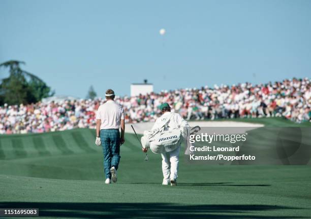 Scottish golfer Sandy Lyle , with his caddy, Dave Musgrove, enroute to winning the US Masters Golf Tournament at the Augusta National Golf Club in...