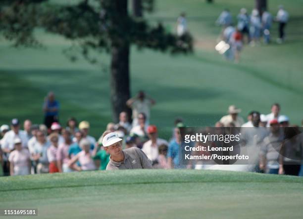 Scottish golfer Sandy Lyle hitting out of a bunker enroute to winning the US Masters Golf Tournament at the Augusta National Golf Club in Georgia,...
