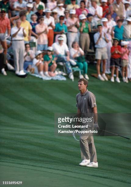 Scottish golfer Sandy Lyle strides up the fairway on the last hole enroute to winning the US Masters Golf Tournament at the Augusta National Golf...