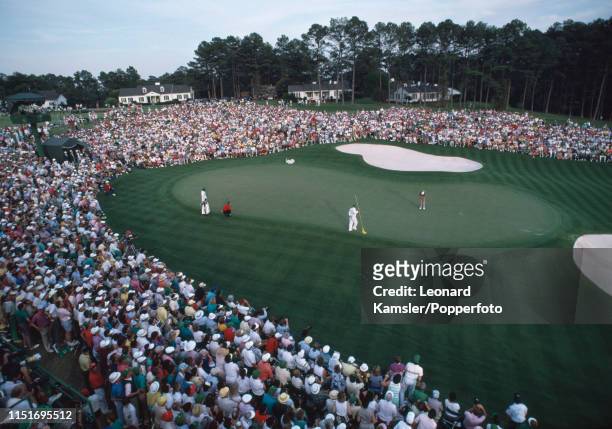 Scottish golfer Sandy Lyle putts on the last green, enroute to winning the US Masters Golf Tournament at the Augusta National Golf Club in Georgia on...