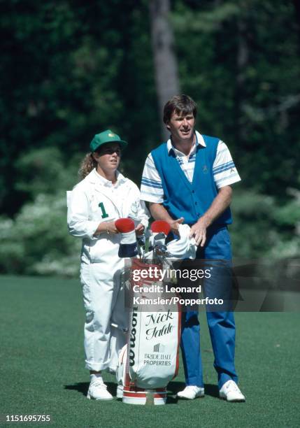 English golfer Nick Faldo with his caddy Fanny Sunesson enroute to winning the US Masters Golf Tournament for the second consecutive year at the...