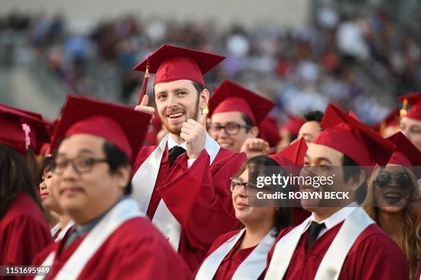 Students earning degrees at Pasadena City College participate in the graduation ceremony, June 14 in Pasadena, California. - With 45 million...