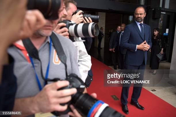 French Prime Minister Edouard Philippe waits for his Russian counterpart during an official visit to Le Havre, western France on June 24, 2019.