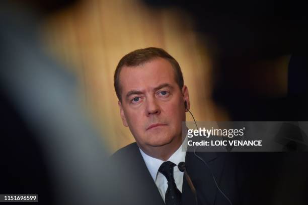 Russian Prime Minister Dmitry Medvedev gives a press conference during an official visit to Le Havre, western France on June 24, 2019.