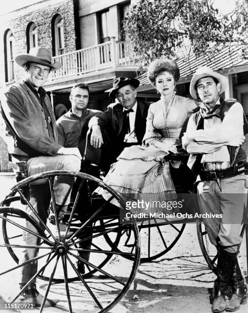 The cast of of TV's 'Gunsmoke' pose for a photo circa 1963 in Los Angeles, California.