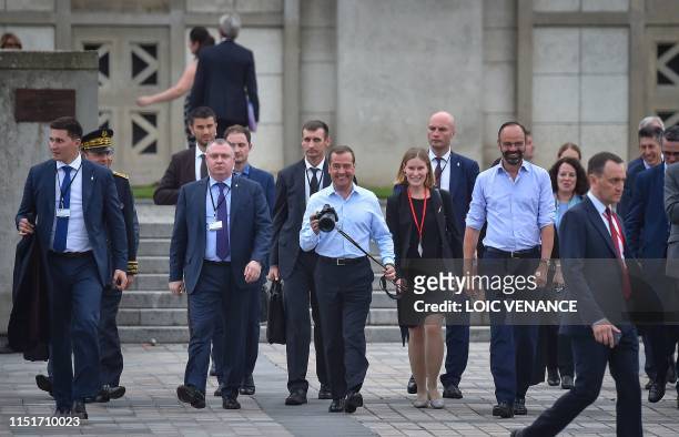 French Prime minister Edouard Philippe and his Russian homolog Dimitri Medvedev walk down during an official visit in Le Havre, western France on...