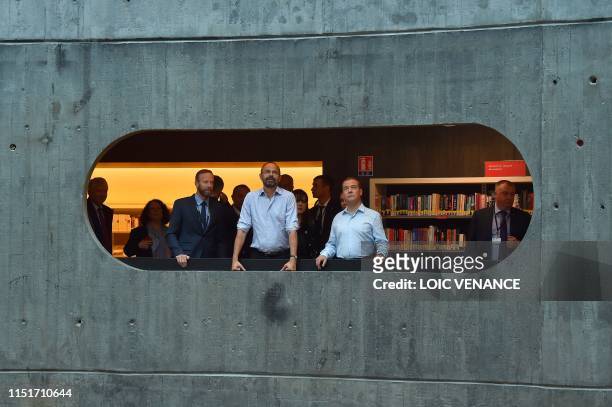 French Prime minister Edouard Philippe and his Russian homolog Dimitri Medvedev visit the Oscar Niemeyer library during an official visit, on June...