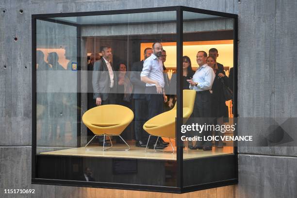 French Prime minister Edouard Philippe and his Russian homolog Dimitri Medvedev visit the Oscar Niemeyer library during an official visit, on June...