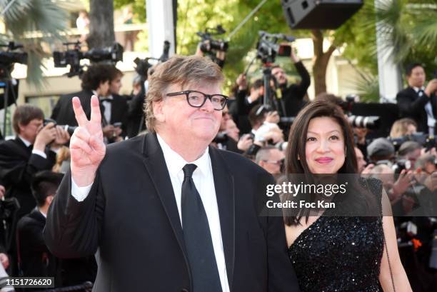 Michael Moore and Sonia Low attend the closing ceremony screening of "The Specials" during the 72nd annual Cannes Film Festival on May 25, 2019 in...