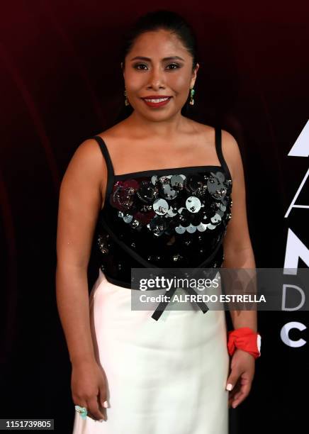 Mexican actress Yalitza Aparicio poses at the red carpet of the 61st edition of the Ariel awards ceremony, at the Cineteca Nacional in Mexico City on...