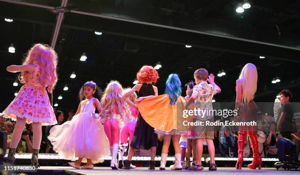 Participants walk catwalk during fashion show at RuPaul's DragCon LA 2019 at Los Angeles Convention Center on May 25, 2019 in Los Angeles, California.