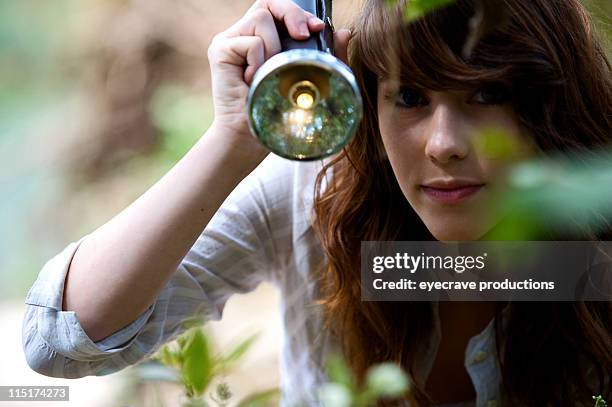 teen girl outdoor flashlight portraits - electric torch stock pictures, royalty-free photos & images