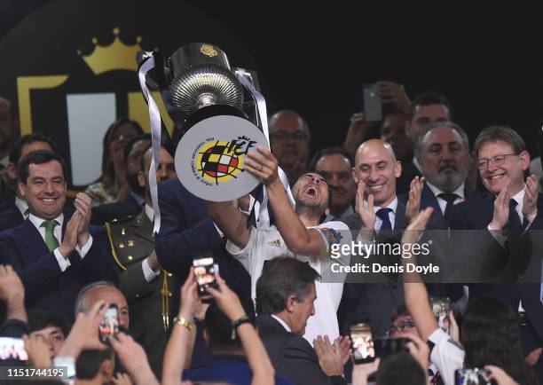 Dani Parejo of Valencia CF celebrates with the trophy at the end of the Spanish Copa del Rey match between Barcelona and Valencia at Estadio Benito...