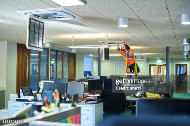 office aircon servicing - air duct repair stock pictures, royalty-free photos & images
