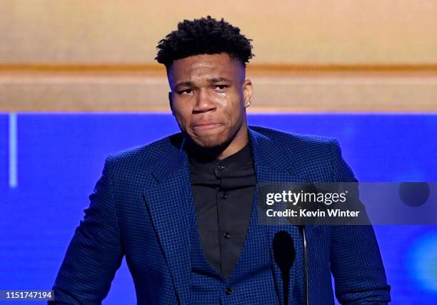 Giannis Antetokounmpo accepts the Kia NBA Most Valuable Player award onstage during the 2019 NBA Awards presented by Kia on TNT at Barker Hangar on...