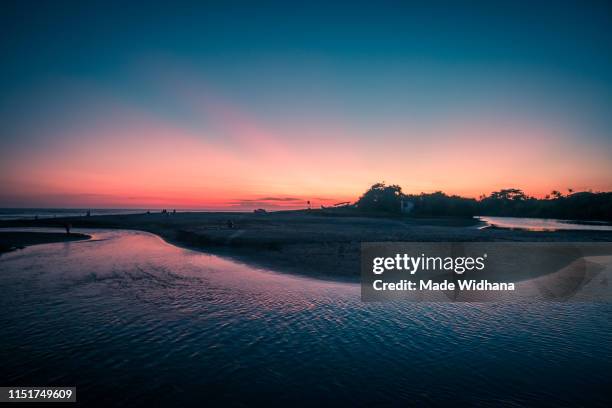 beach after the sunset - made widhana stock pictures, royalty-free photos & images