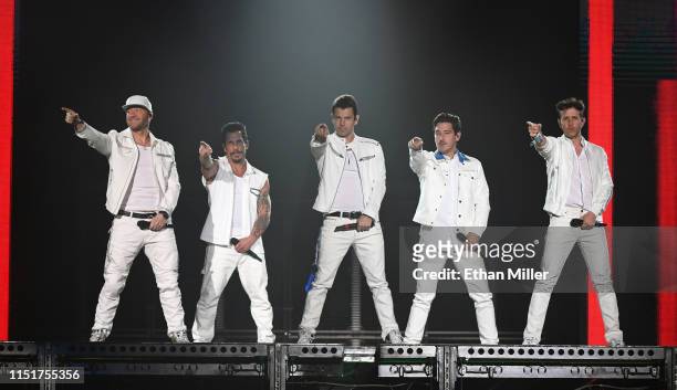 Singers Donnie Wahlberg, Danny Wood, Jordan Knight, Jonathan Knight and Joey McIntyre of New Kids on the Block perform during a stop of the Mixtape...