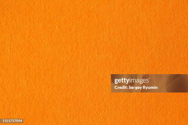 orange felt - felt textile stock-fotos und bilder