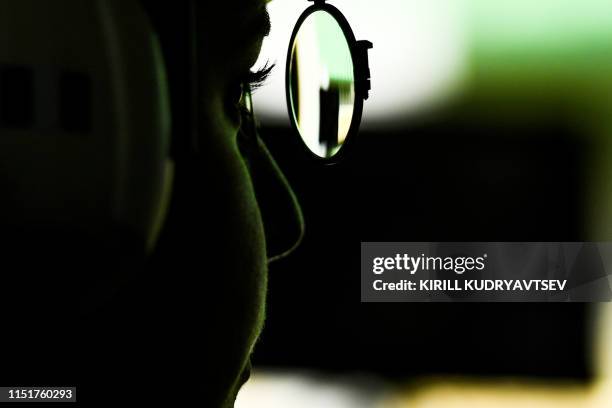 France's Mathilde Lamolle competes in the 25m pistol woman qualification at the 2019 European Games in Minsk on June 25, 2019.