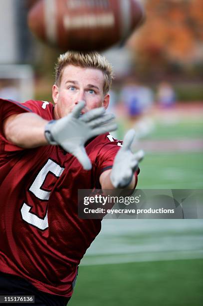 sports football player practice - college quarterback stock pictures, royalty-free photos & images