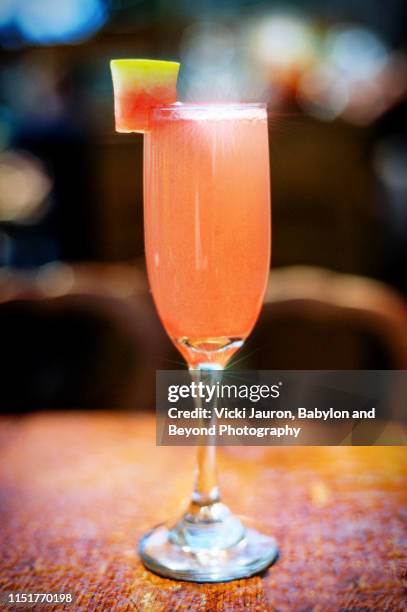 sparkling watermelon cocktail served at brunch at a bar on long island. - bellini stock pictures, royalty-free photos & images