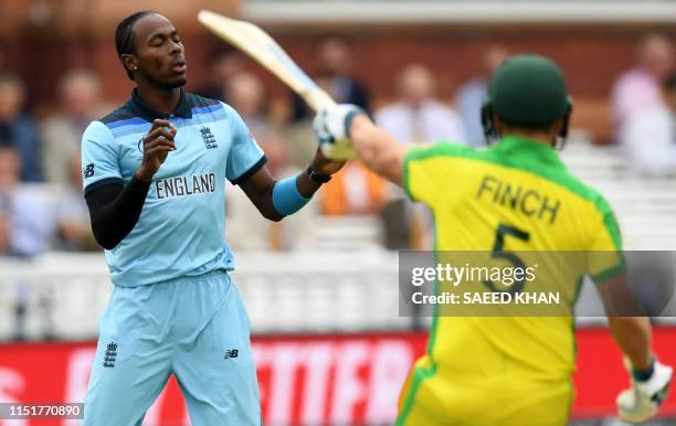 England's Jofra Archer reacts after a delivery to Australia's captain Aaron Finch during the 2019 Cricket World Cup group stage match between England...