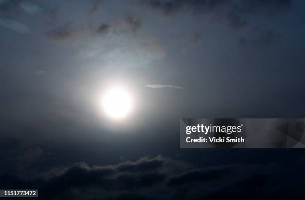 full moon rising in the clouds - event horizon telescope stock pictures, royalty-free photos & images