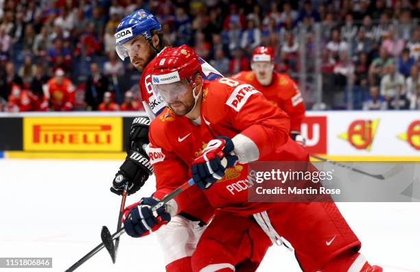 Ale xander Ovechkin of Russia challenges Michael Frolik Czech Republic during the 2019 IIHF Ice Hockey World Championship Slovakia third place...