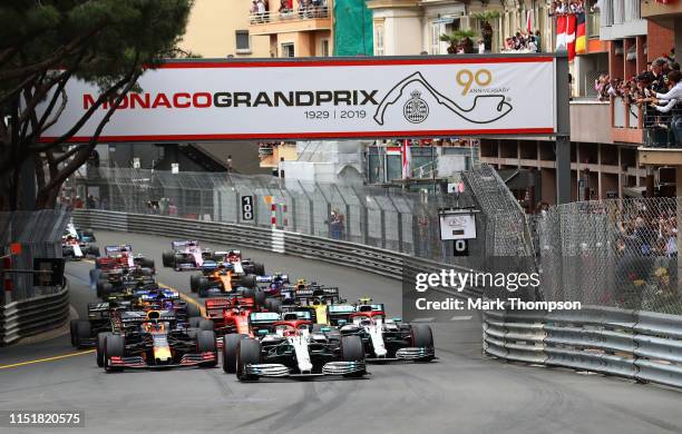 Lewis Hamilton of Great Britain driving the Mercedes AMG Petronas F1 Team Mercedes W10 leads the field at the start during the F1 Grand Prix of...