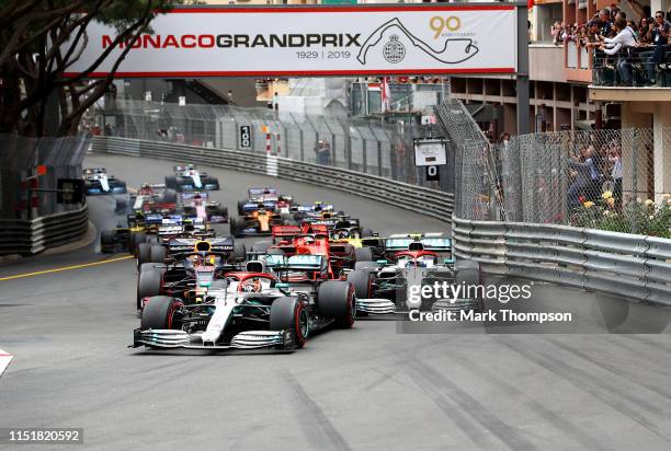 Lewis Hamilton of Great Britain driving the Mercedes AMG Petronas F1 Team Mercedes W10 leads the field at the start during the F1 Grand Prix of...