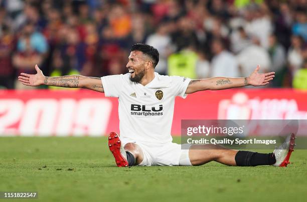 Ezequiel Garay of Valencia CF celebrates during the Spanish Copa del Rey Final match between Barcelona and Valencia at Estadio Benito Villamarin on...