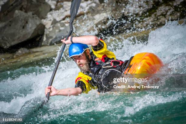 kayaker on river soča - kayaking rapids stock pictures, royalty-free photos & images