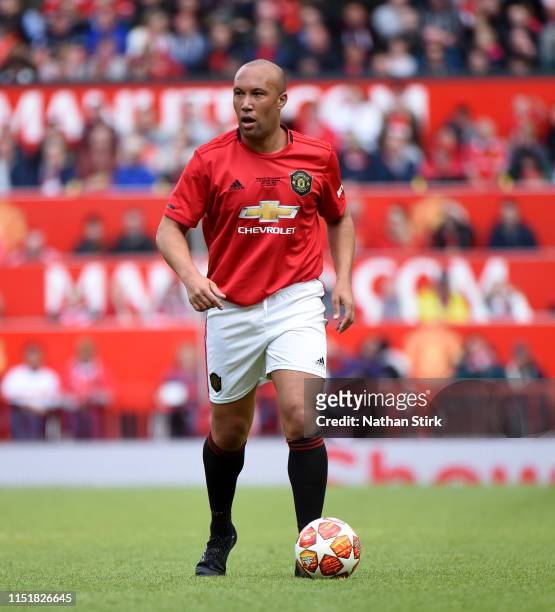 Mikael Silvestre of Manchester United in action during the Manchester United '99 Legends v FC Bayern Legends at Old Trafford on May 26, 2019 in...
